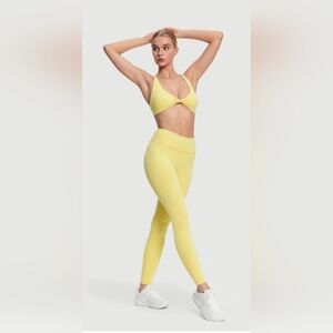 SOLD BetterMe Side Pocket Leggings And Twist Front Top In lemon Meringue